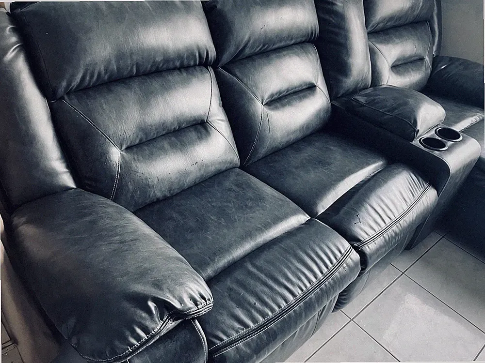 Power Reclining Sectional Sofa with Cup Holders and Console by Ashley Furniture